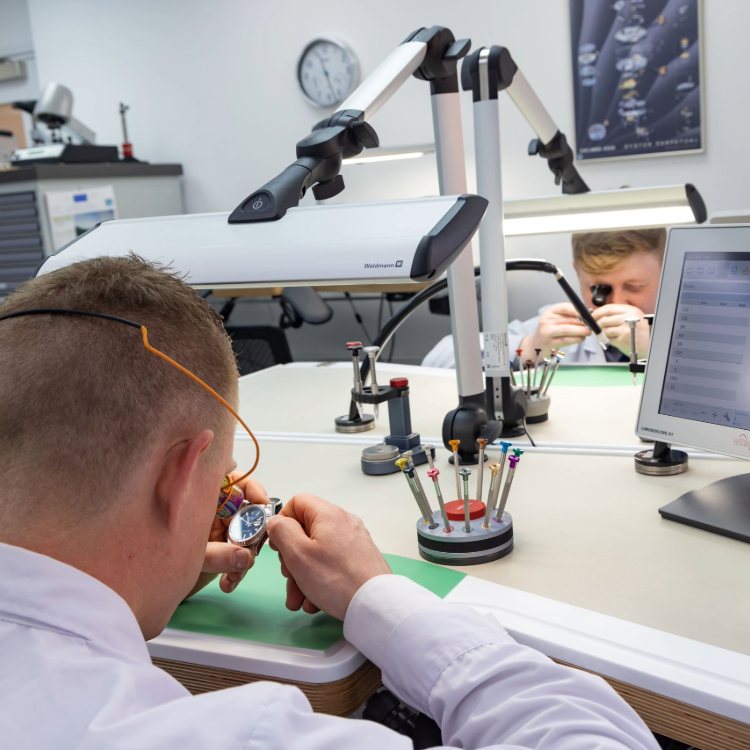 Pragnell watchmaker conducting detailed servicing and inspection of a luxury wristwatch