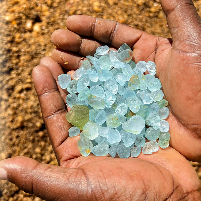 Gemstone specialists selecting rare African coloured gemstones