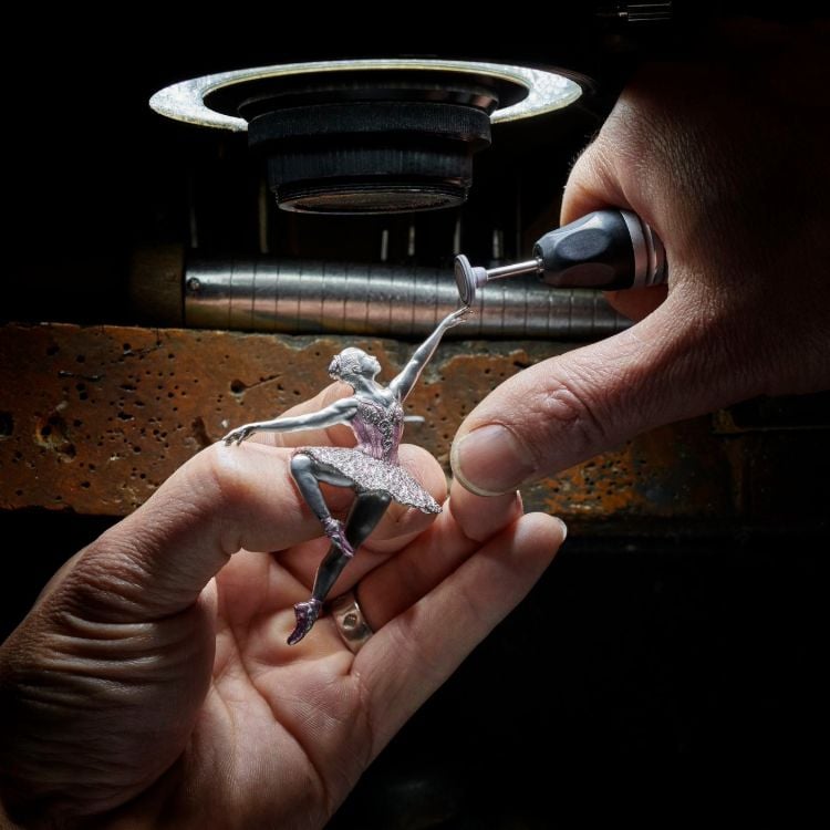 Jeweller hand-finishing a diamond-set ballerina brooch in the Pragnell workshop