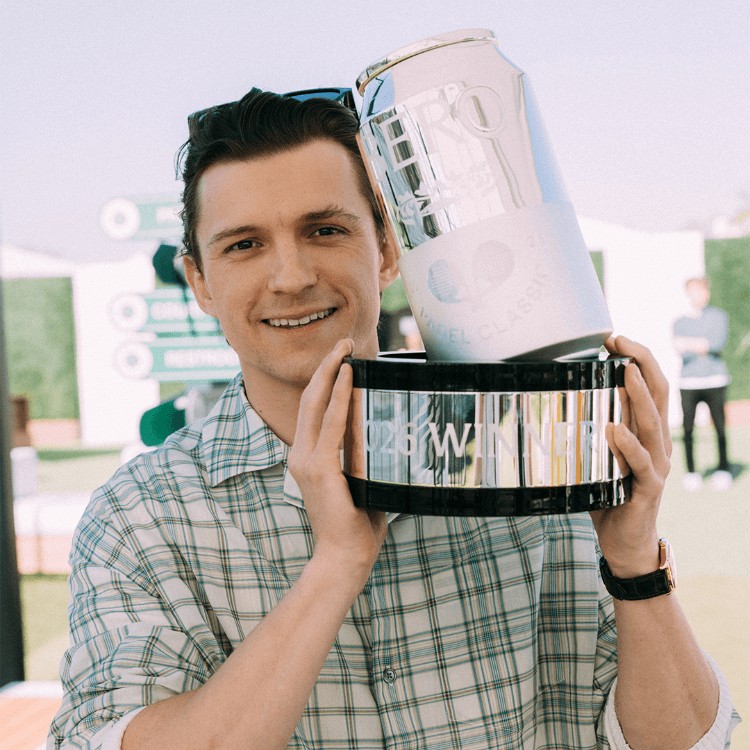 Tom Holland holding the Pragnell-designed 2026 BERO Padel Classic trophy