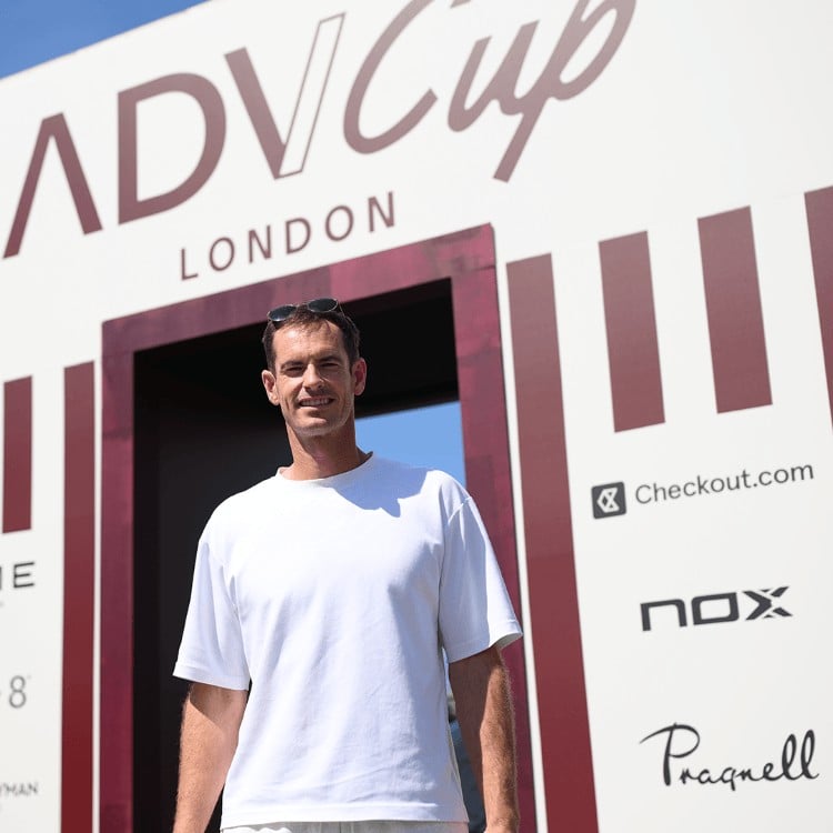 Andy Murray standing in front of ADV Cup London event signage